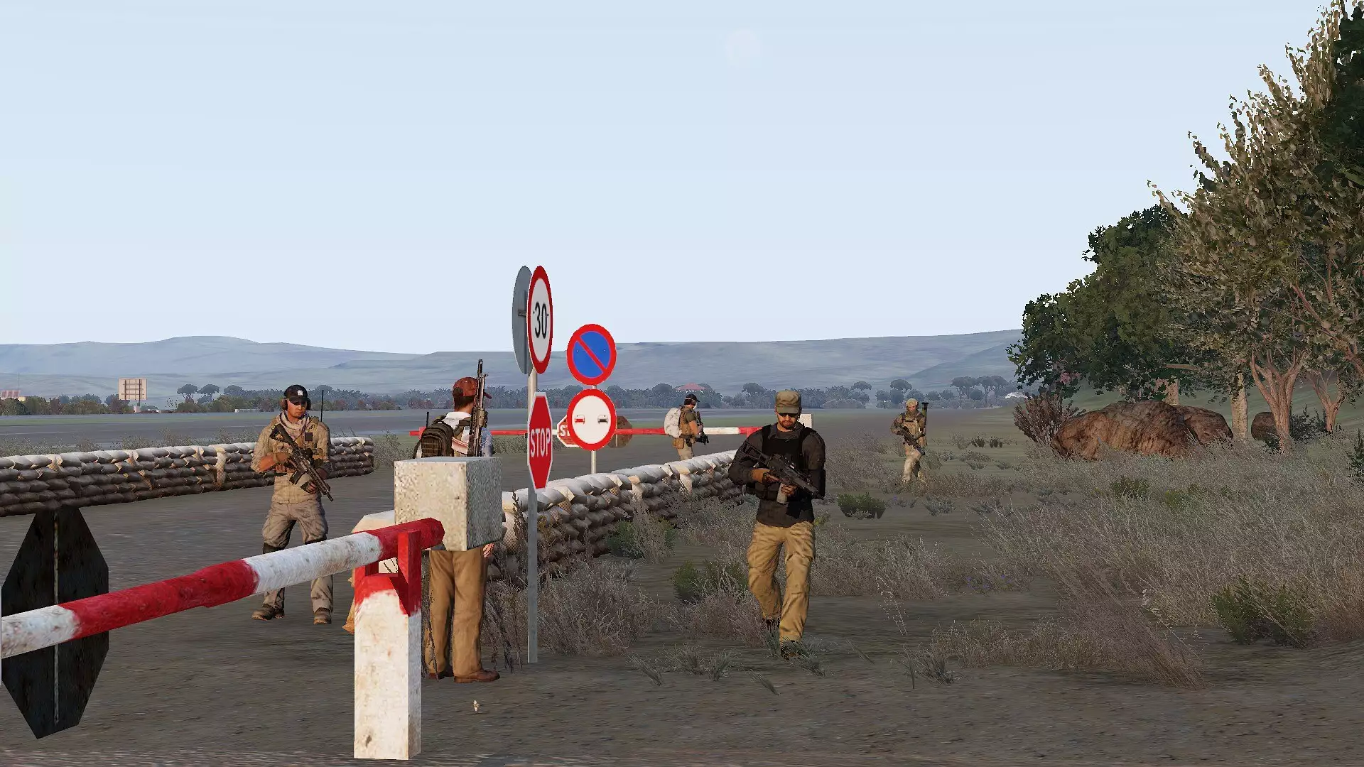 contractors patrol around a checkpoint